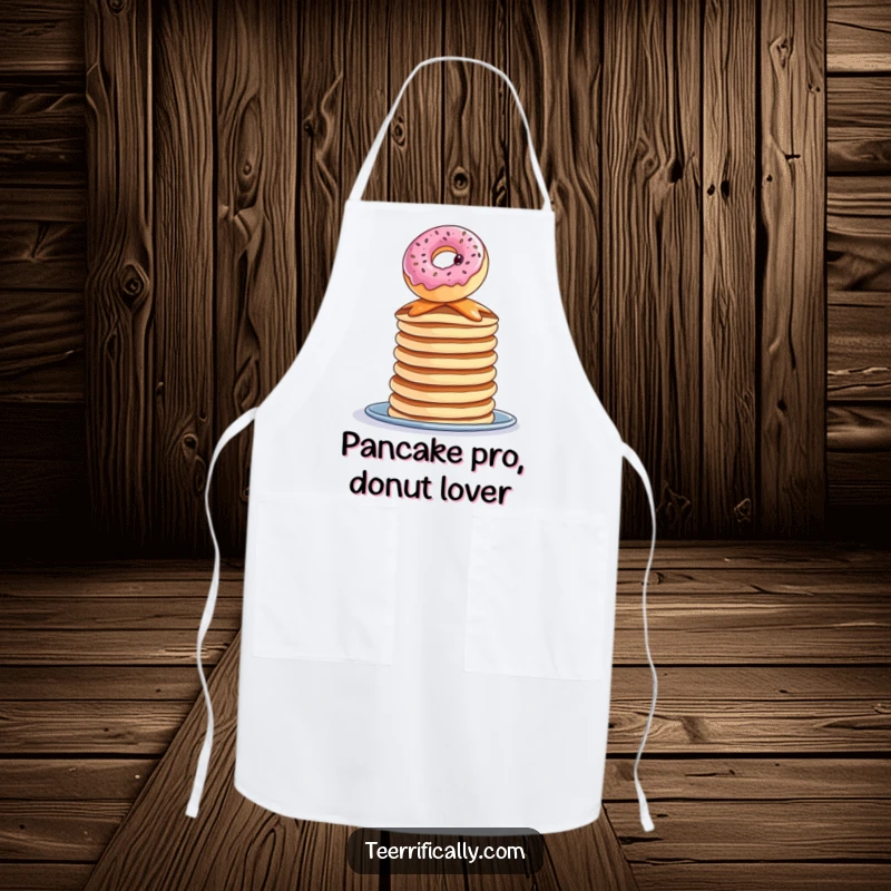 Funny donut pancake apron, a curious donut balancing precariously on pancakes, kitchen wear, humorous for cooking.