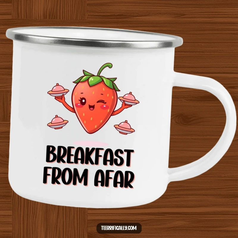 Funny winking strawberry juggling small flying saucers on a sturdy camping mug, ideal for outdoor humorous adventures.