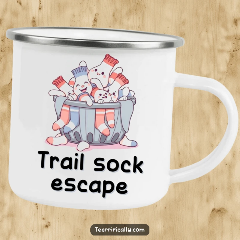Funny camping mug showing a giggling pile of socks humorously trying to escape a laundry basket, ready for outdoor mischief.