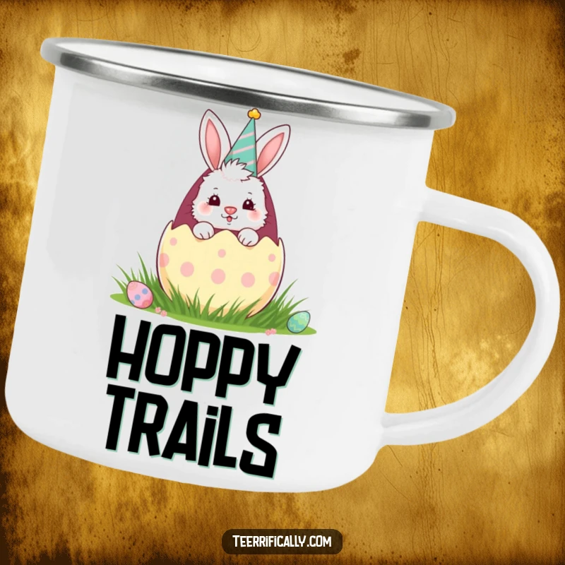 Funny camping mug with a fluffy bunny in a party hat peeking from a giant Easter egg, ready for outdoor adventures and festive beverages.
