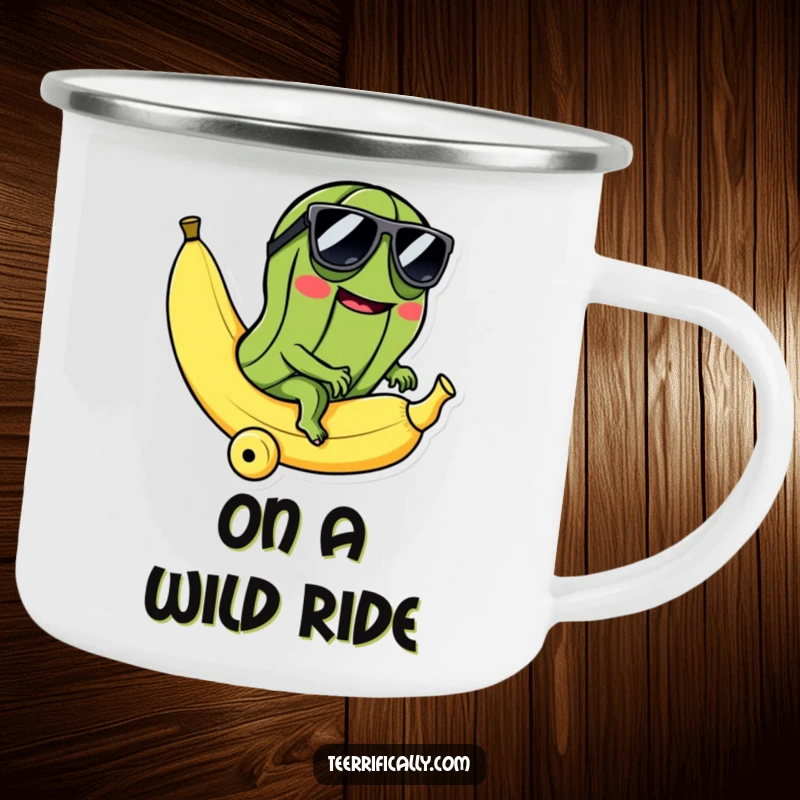 Funny camping mug showing a cool pickle in sunglasses riding a rolling banana, ideal for outdoor adventures and humorous sips.