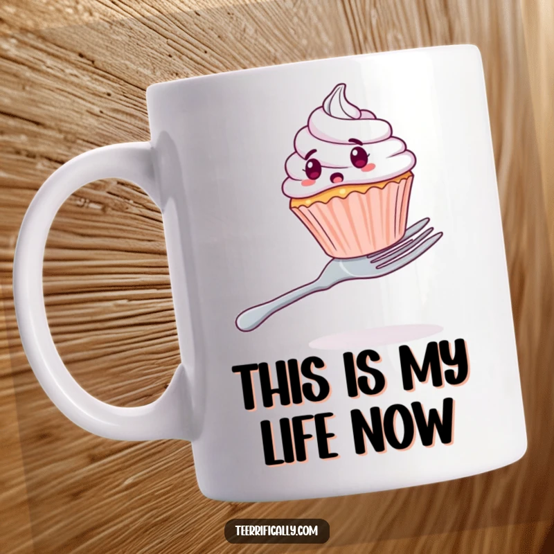 Funny mug showing a shocked cupcake struggling to balance on an oversized fork, perfect for dessert lovers and anyone needing a chuckle.