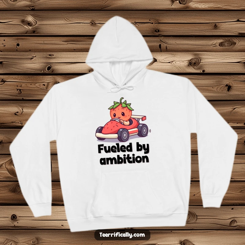 Funny hoodie depicting a determined strawberry heroically driving a tiny race car crafted from a berry, showcasing a humorous competition.