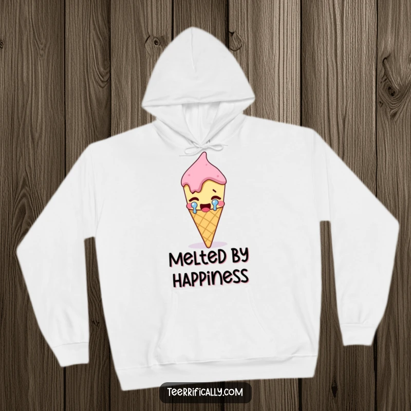 Funny melting ice cream cone shedding a big tear of joy, soft and cozy hoodie, humorous dessert apparel, celebrating happiness.
