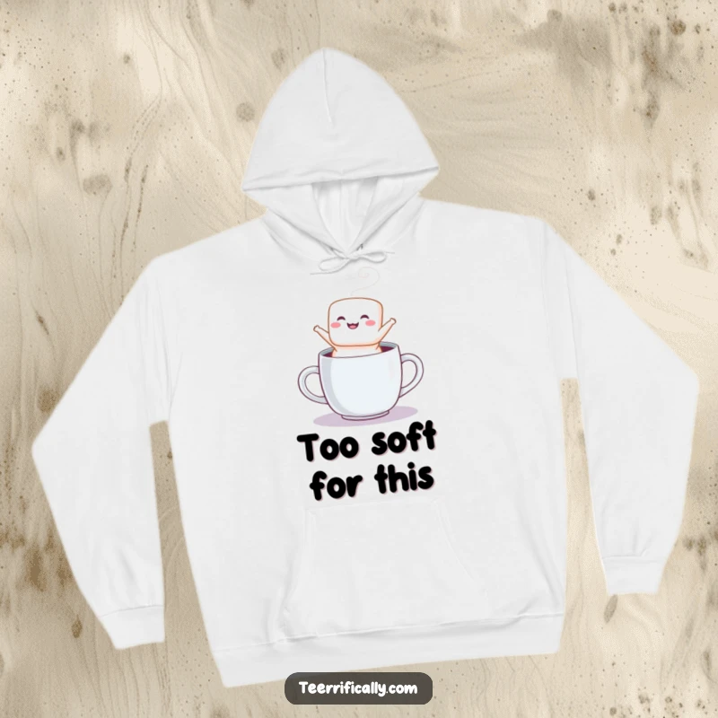Funny hoodie depicting a fluffy marshmallow jumping excitedly from a steaming mug, symbolizing comfort and happiness.