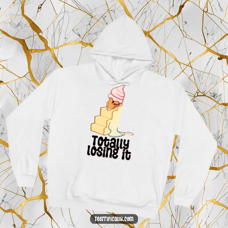 Funny hoodie showing a melting ice cream cone comically sliding down a staircase constructed from toast.