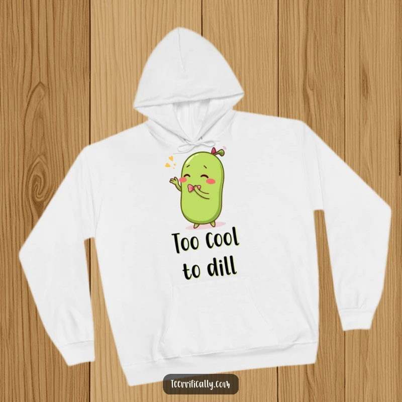 Funny hoodie illustrating a sentient pickle in a grand, theatrical bow, conveying dramatic flair and comedic delight.