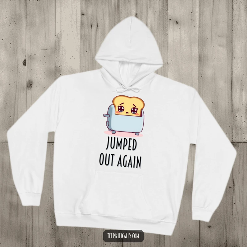 Funny hoodie featuring a startled slice of toast jumping out of a toaster, offering cozy comfort and breakfast-themed humor.