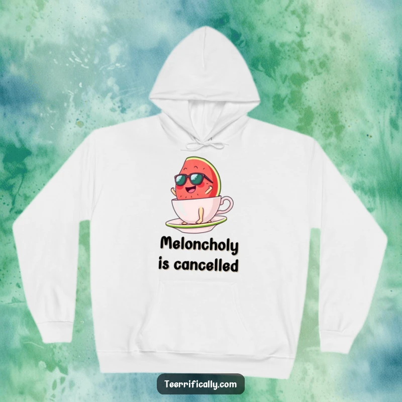 Funny watermelon slice hoodie, sunglasses on, surfing a giant teacup, embodying summer fun and a carefree attitude. Cozy and cool.