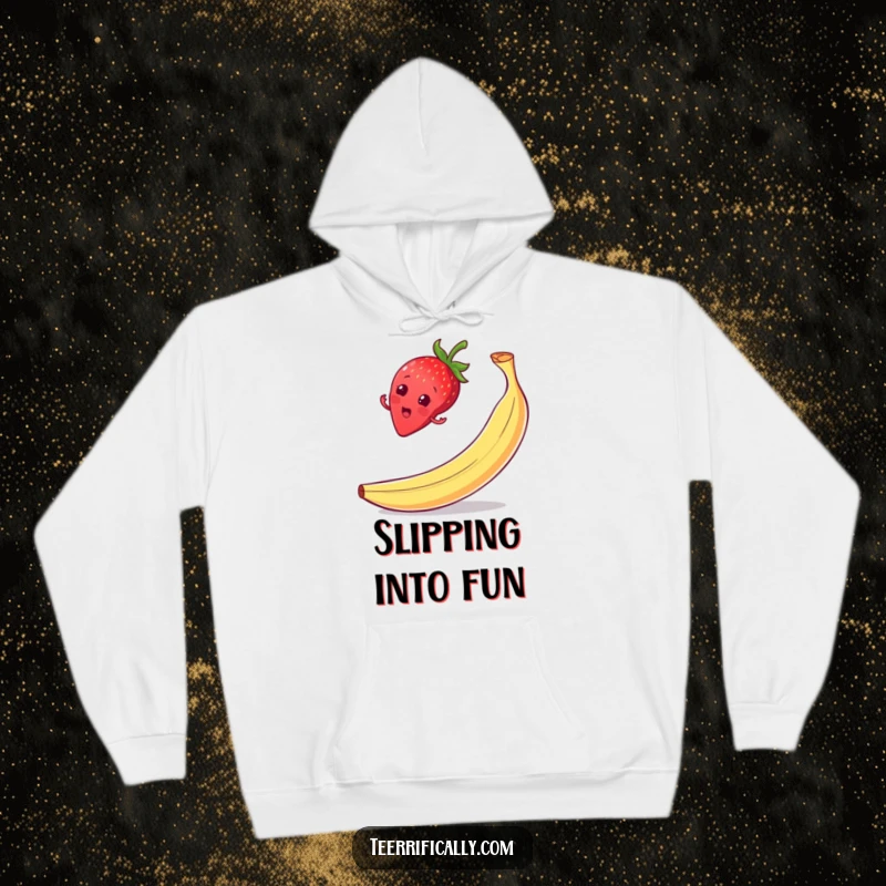 Funny strawberry balancing hoodie, on a banana peel with a surprised grin, conveying humorous struggle and warmth.