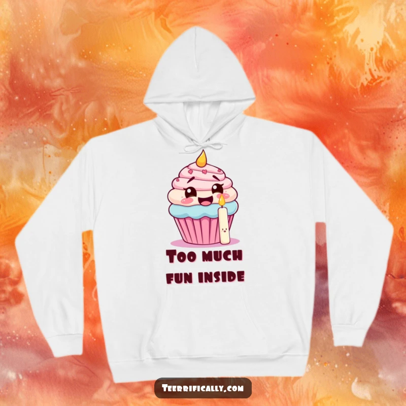 Funny hoodie featuring a giggling cupcake trying to eat its own candle, offering cozy warmth and sweet birthday humor.
