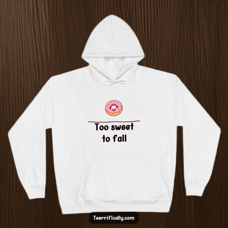 Funny donut hoodie showing a cheerful donut performing a precarious tightrope walk, symbolizing balance and a love for sugary treats, cozy and warm.