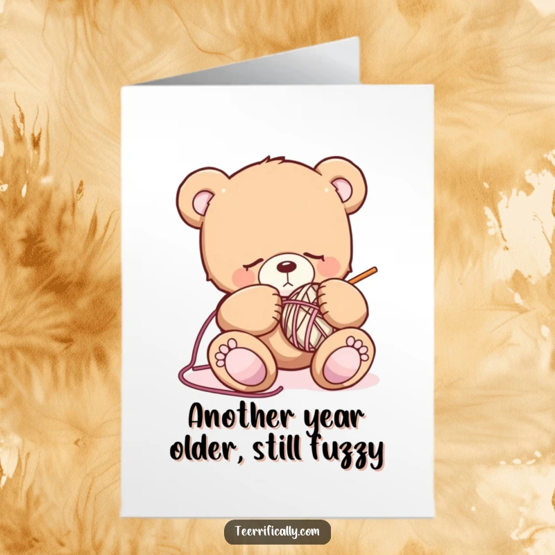 Funny Free Printable Teddy Bear Birthday Card: A sleepy bear struggling to knit a ball of yarn, looking adorable.