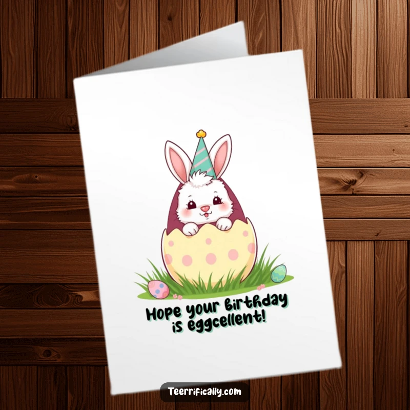 Funny Free Printable Birthday Card: Fluffy bunny in party hat peeks from a giant Easter egg.