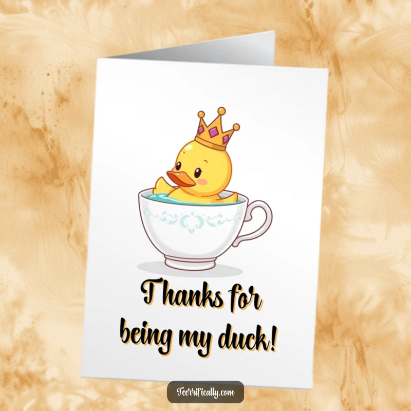 Funny Free Printable Thank You Card: A rubber duck wearing a tiny crown floats serenely in a teacup, offering a posh thank you.
