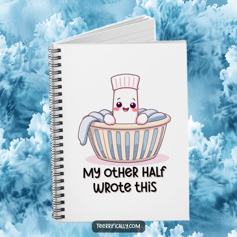 Funny Notebook with a pleased sock finding its mate in a laundry basket, ideal for jotting notes with a touch of heartwarming humor.