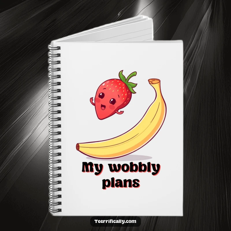 Funny strawberry slip notebook, balancing on a banana peel with a surprised grin, ideal for jotting notes.