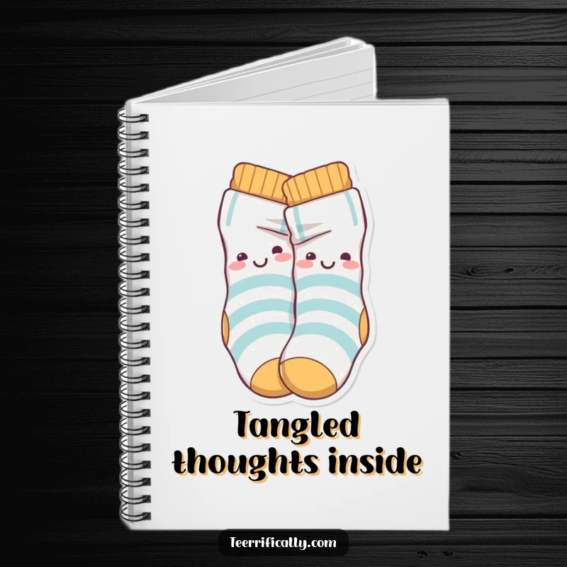 Funny Notebook featuring playful sock characters happily tangled in a knot, ideal for writing and doodling humorously.