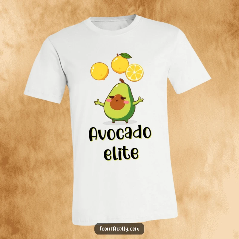 A determined tiny avocado skillfully juggles three yellow lemons, printed on a t-shirt, symbolizing resilience and fruity focus.