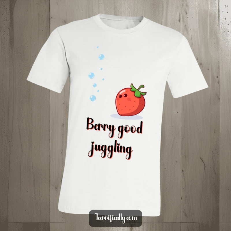 Funny t-shirt showcasing a cheerful strawberry gleefully juggling small, sparkling water droplets in mid-air.