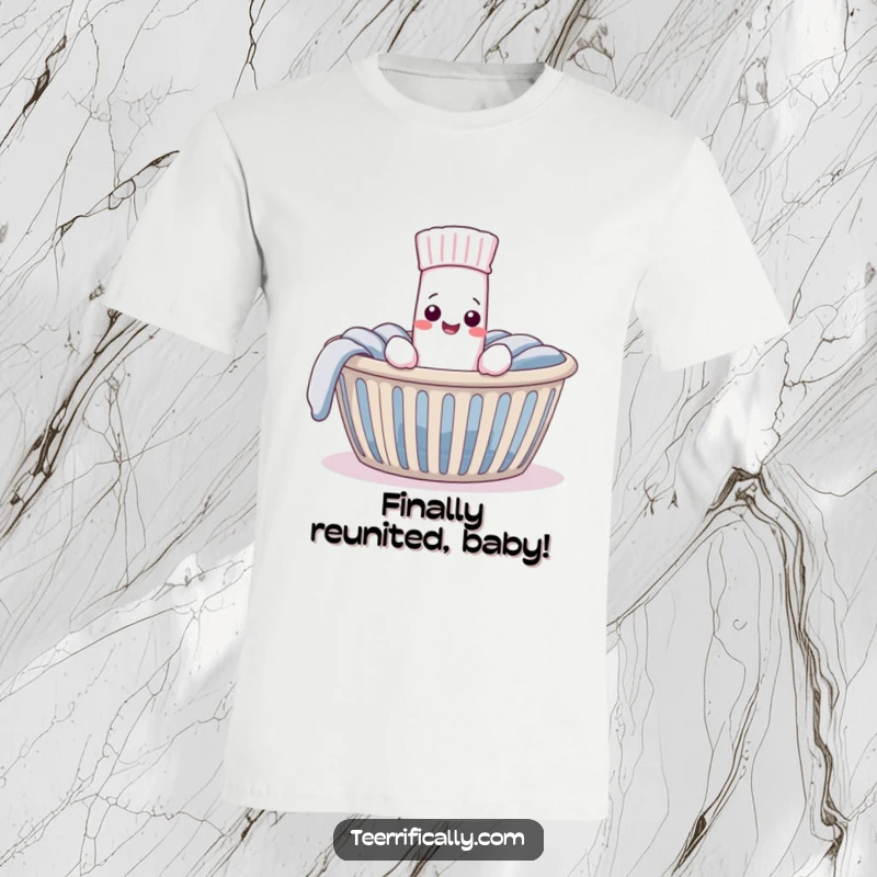 Funny T-Shirt showing a very pleased sock discovering its long-lost mate in a laundry basket, celebrating perfect pairs and laundry day wins.