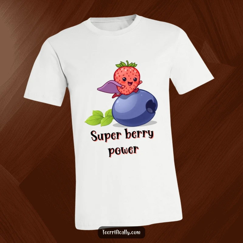 Funny strawberry superhero t-shirt, a happy strawberry in a cape leaping over a blueberry, energetic and humorous apparel.