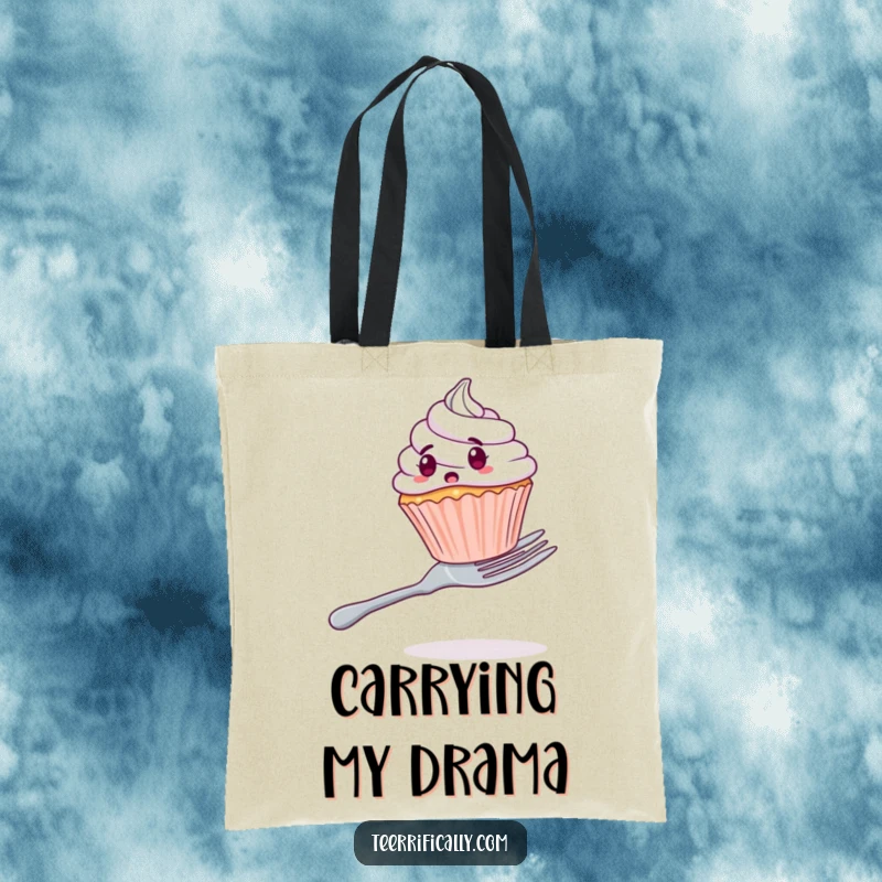 Funny tote bag with a surprised cupcake balancing precariously on a large fork, ideal for shoppers who love humor.